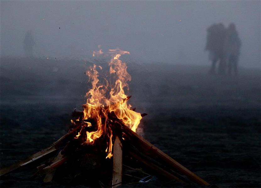 هنر عکاسی دود و آتش Ara شعله هاى انتظار و امید( صید ماهى در ساحل دریاى خزر)