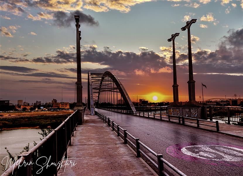 هنر عکاسی محفل عکاسی مهران شوشتری غروب آفتاب اهواز بر روی پل سفید.